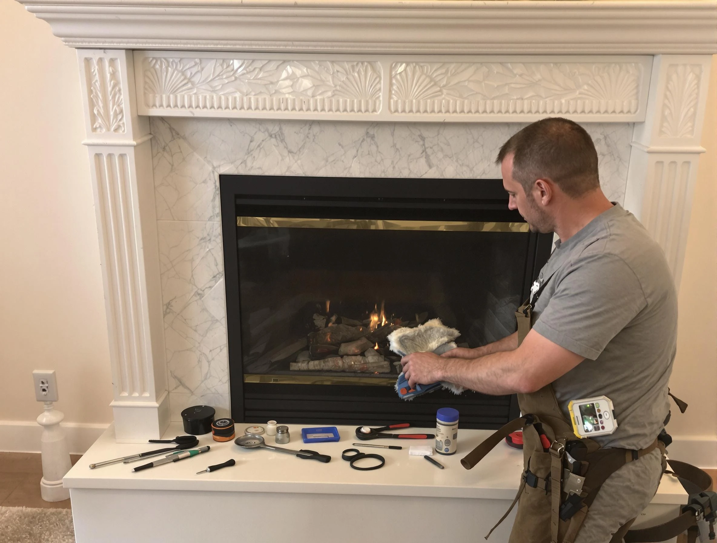 Lilburn Chimney Sweep performing fireplace maintenance in Lilburn, GA